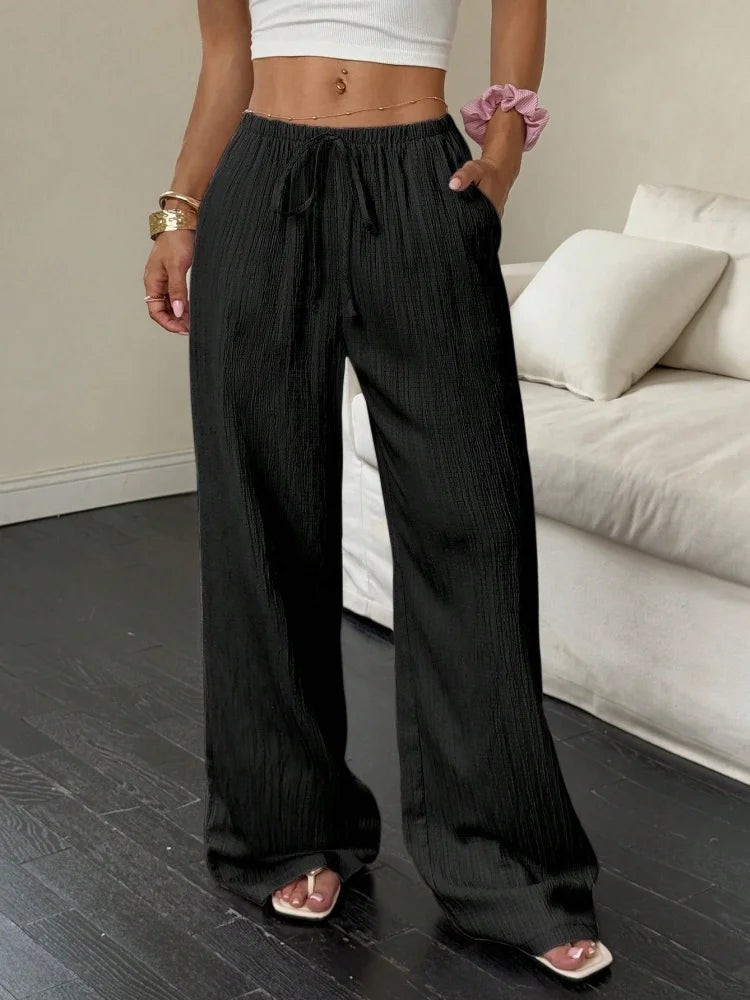 Pantalon Large Femme – Tissu Uni, Poches Latérales, Taille à Ceinture, Nouveau Style Été 2026